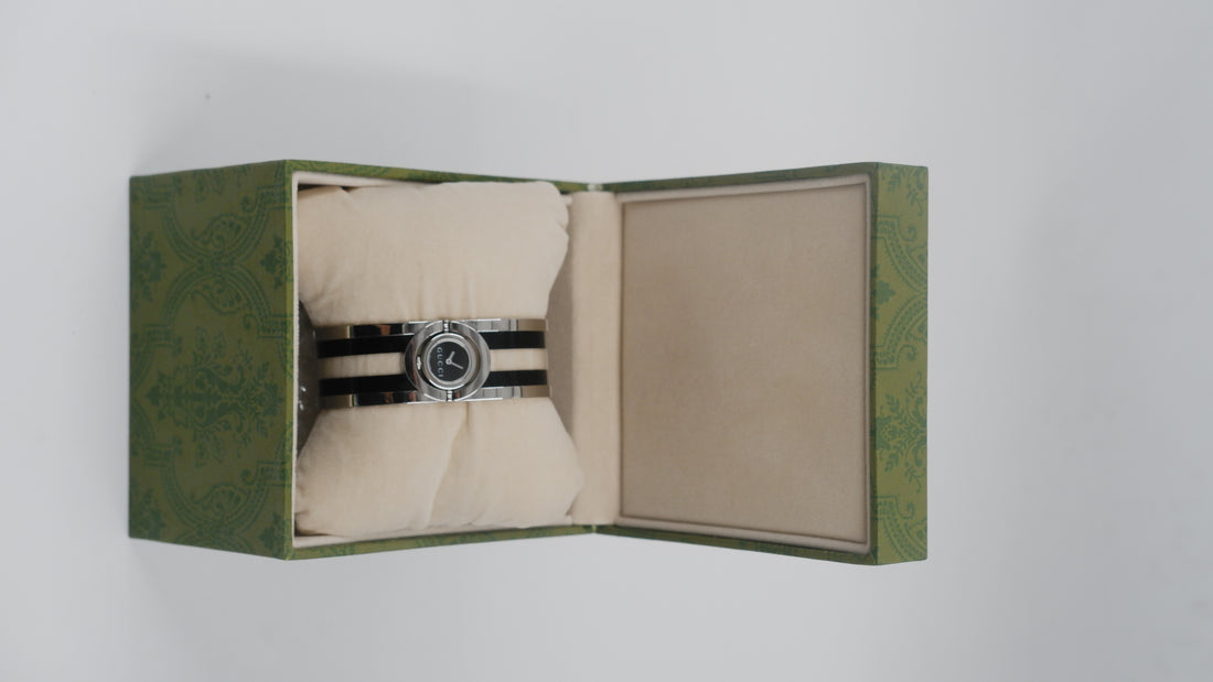 Twirl 112 Silver Bangle Quarts Analog Women's Watch